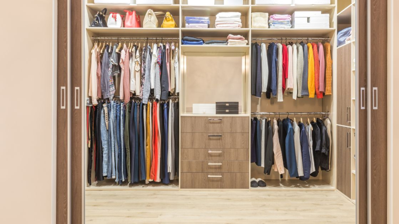 modern closet system with integrated lighting and accessories