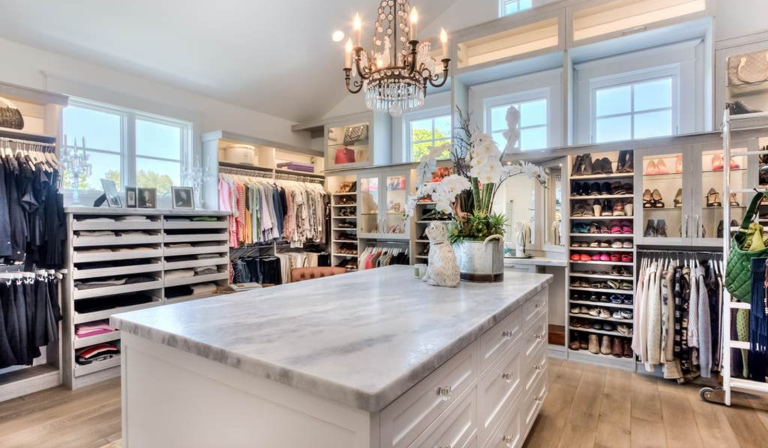 Walk-in closet design in Farmingdale NJ with custom shelving and drawers